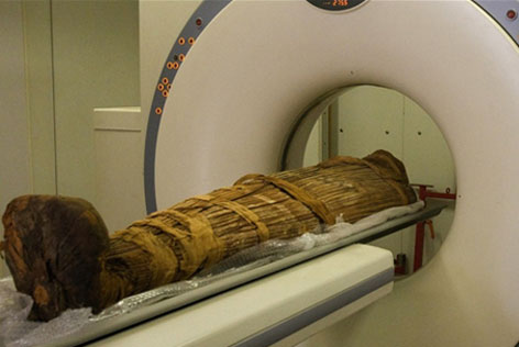 Mummy entering scanner during testing
